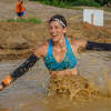 Hart makes her way through the mud pit.