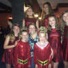 Karyn Oster (center) with some of the school's dancers.