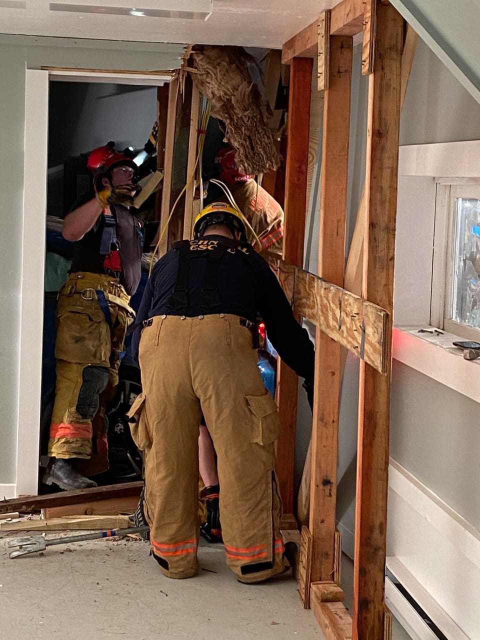 Once the driver and passenger were safely removed, crews carried out structural safety measures and winched the car from the building, authorities said.