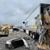 A crash involving two tractor-trailers shut down the westbound lanes of Route 78 and scattered debris throughout the highway Thursday afternoon, authorities said.