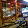 A car smashed into Martino's Pizzeria and Deli in Danbury, causing extensive damage to the building's interior.