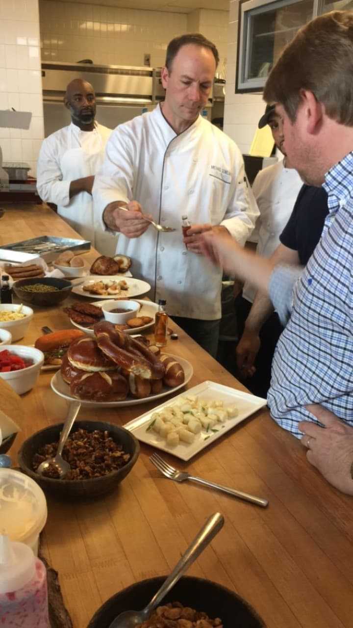 The staff at Harlan Haus in downtown Bridgeport are putting together the menu before the beer hall opens in January.