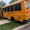 Two drivers were injured when a car and school bus collided.