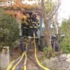 Bridgeport firefighters attack a kitchen fire.