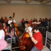 Fifth-grade orchestra students from Anne Hutchinson and Greenvale schools entertained Eastchester senior citizens with a concert on Valentine's Day.