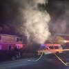 Fire crews battled a blaze on Oakley Avenue in Elmont.