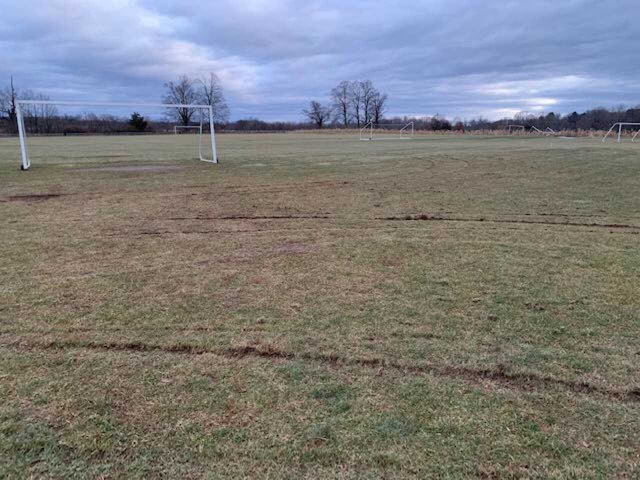 The fields for the Red Hook Soccer Club were damaged by a vandal driving along the grass.