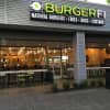 The decor at the newly opened BurgerFi in Poughkeepsie is made from recycled materials and its burgers are made with beef from the company's own grass-fed cattle.