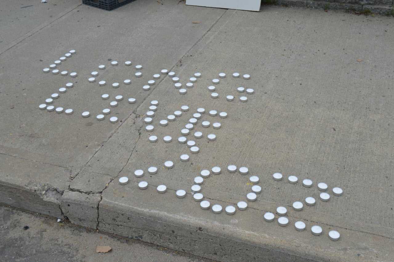 Memorials lay at the site of a police officer-involved fatal shooting Tuesday night near the corner of Fairfield and Park avenues in Bridgeport.