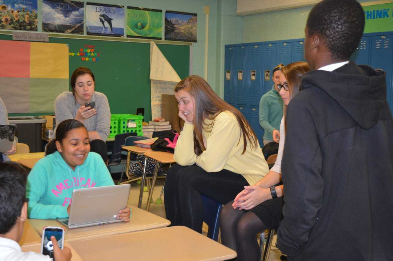Sacred Heart University mentors and John Winthrop School students work to improve graduation rates in Bridgeport through the Jones-Zimmermann Academic Mentoring Program.