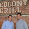 Colony Grill Co-Owners Ken Martin and Paul Coniglio pose for a photo Tuesday in their new Norwalk store.