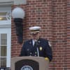 New Canaan Fire Chief John Hennessey leads the Sept. 11 remembrance ceremony on the steps of Town Hall Friday.