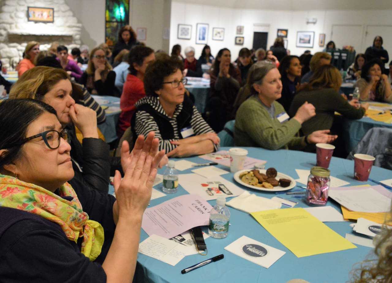 Members of Women for Progress applaud Freeholder Tracy Silna Zur.