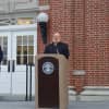 Msgr. William Sheyd leads the crowd in a prayer at New Canaan's Sept. 11 ceremony.