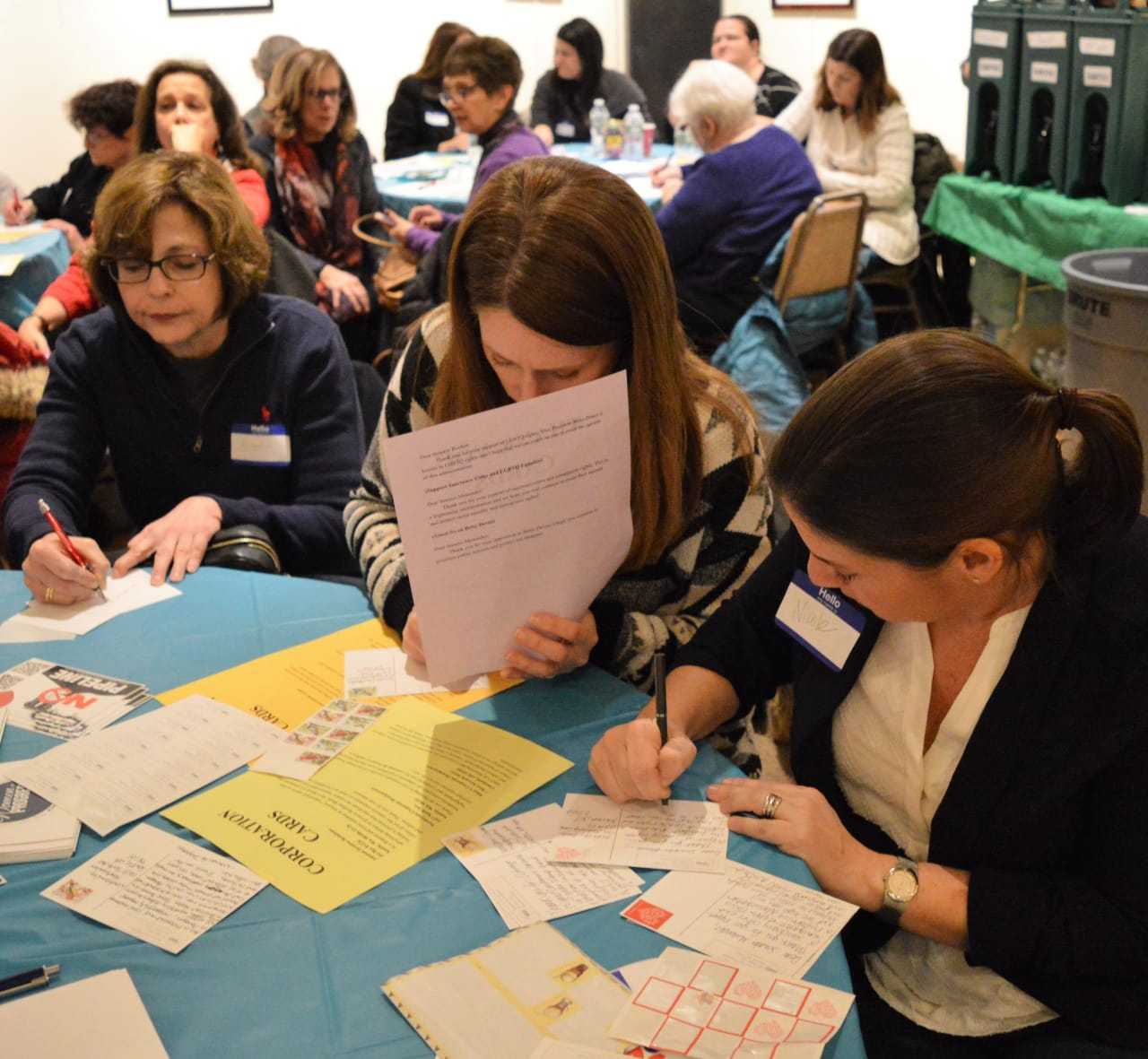 Women for Progress pen postcards and letters to legislators and corporate leaders.