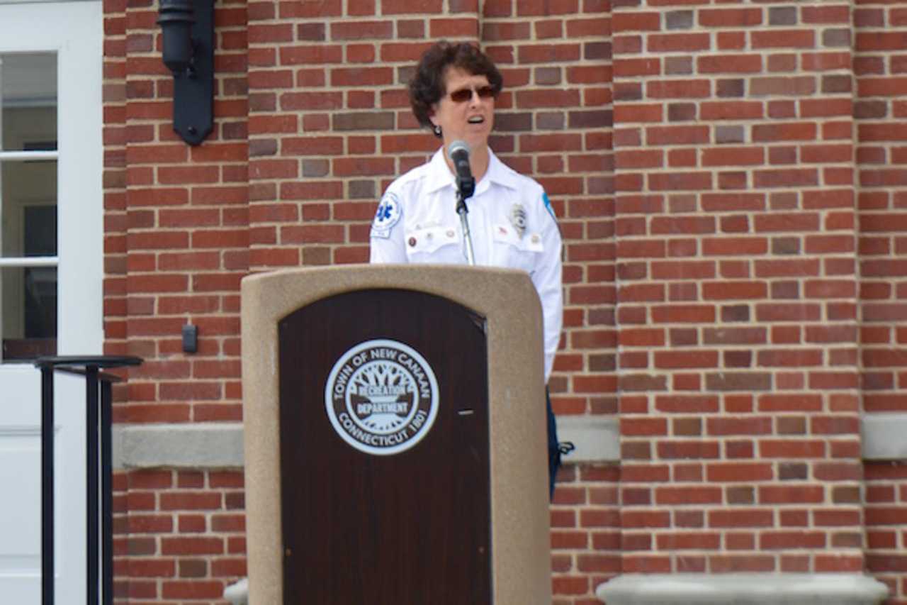 Nancy Upton closes out the Sept. 11 remembrance ceremony with a rendition of "God Bless America."