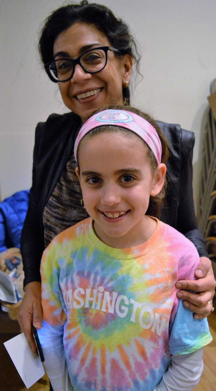 Young daughters and granddaughters are welcome at Women for Progress meetings. Here is executive committee member Nayla Bahri of Wyckoff and her 8-year-old daughter, Lana.