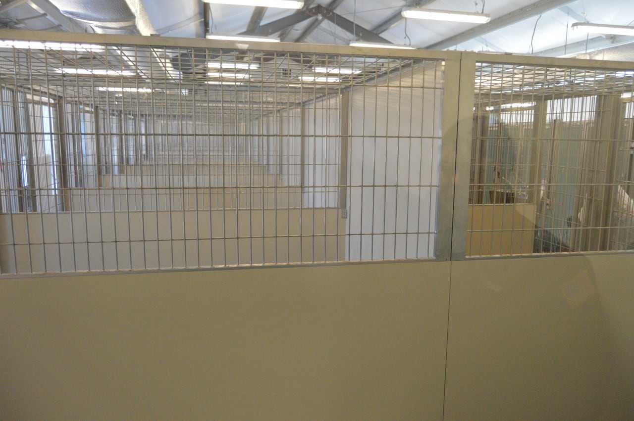 The room where dogs are kept to keep warm and fed. To not disturb the dogs or upset them, the photographer wasn't allowed inside. Adopters are always welcomed inside.
