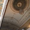 The ceiling of the Majestic Theater's lobby retains much of its original grandeur.