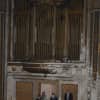 City leaders tour the Majestic Theater, which still retains its massive organ pipes.