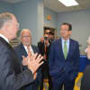 Sikorsky President Dan Schultz discusses manufacturing with HCC Advanced Manufacturing Director Richard DuPont, Gov. Dannel Malloy and Lt. Gov. Nancy Wyman at Housatonic Community College.