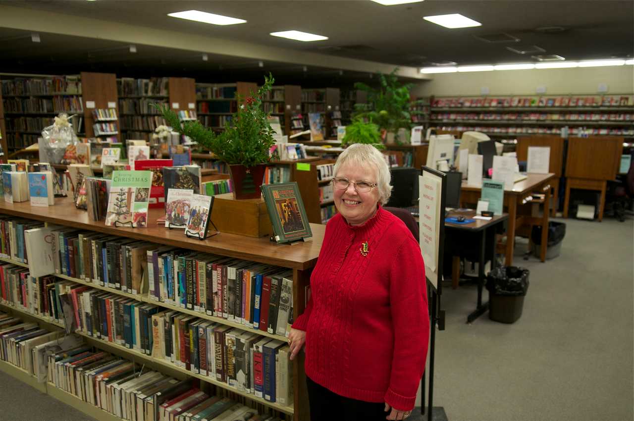 A library worker welcomes visitors at Sunday's reception.