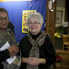 Elspeth Lydon, director of libraries in Shelton, chats with guests at Sunday's reception.