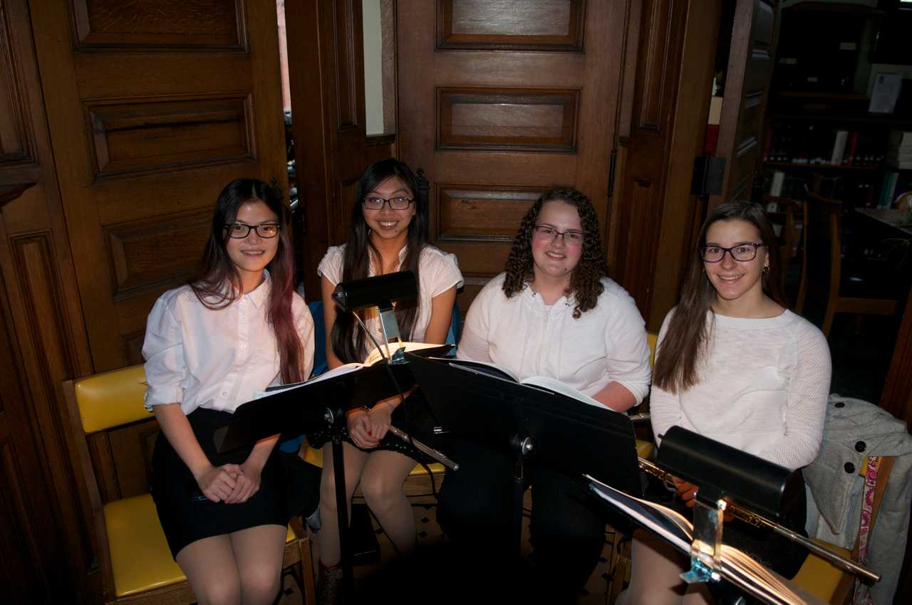 A flute quartet from Shelton High School performs for the crowd.
