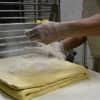 Baker Bill Sidlovsky of West Milford works on laminating Danish dough.