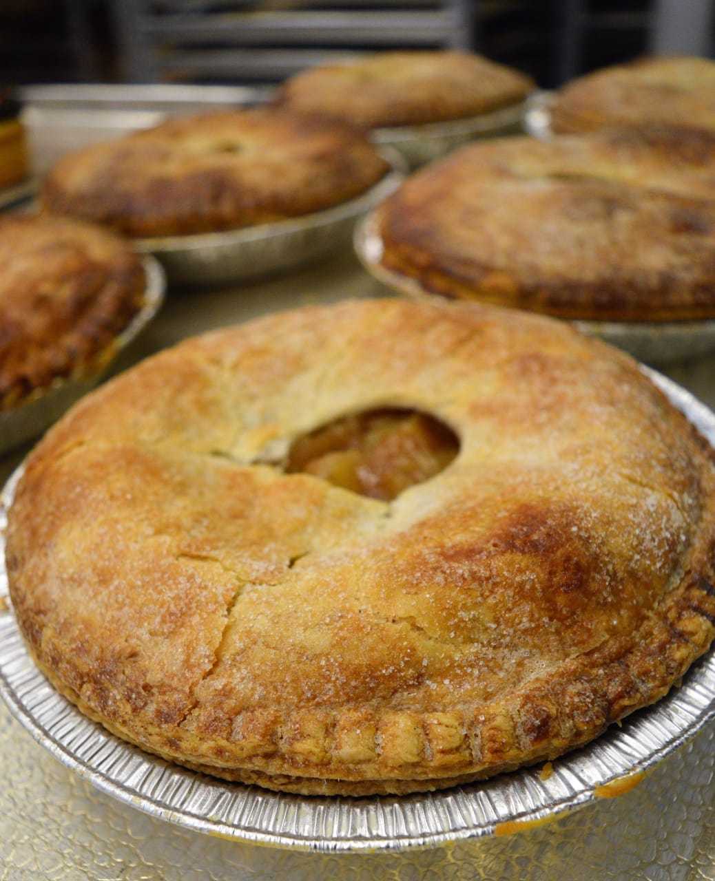 Apples pies fresh from the oven at Reinhold's Quality Bakery.