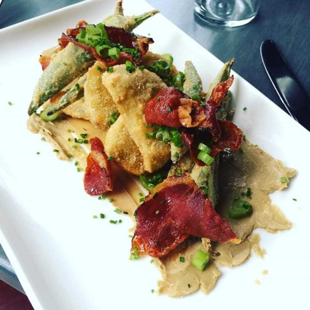 The fried green tomatoes with okra is one of many dishes on the menu at Essie's, a Poughkeepsie restaurant names for the owner/chef, Brandon Walker's grandmother.