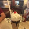 A chocolate ice cream soda is topped with whipped cream and a cherry at the Eveready Diner in Hyde Park. Does kiddie comfort food get any better than this?