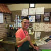 Nelson Guerra mans the counter at Frank's Pizza in West Milford.