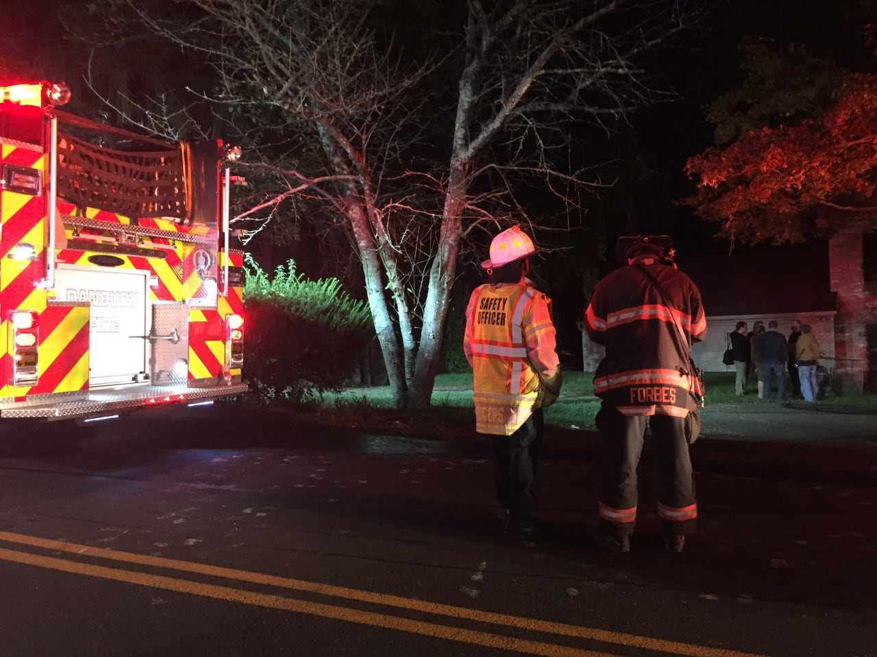Danbury firefighters knock down a two-alarm blaze at 43 Stadley Rough Road on Tuesday evening.