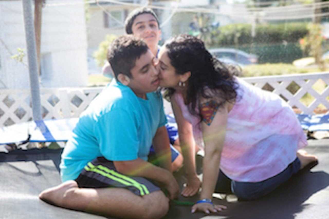 <p>Aidan, his mom Johanna and brother Dailey (rear).</p>