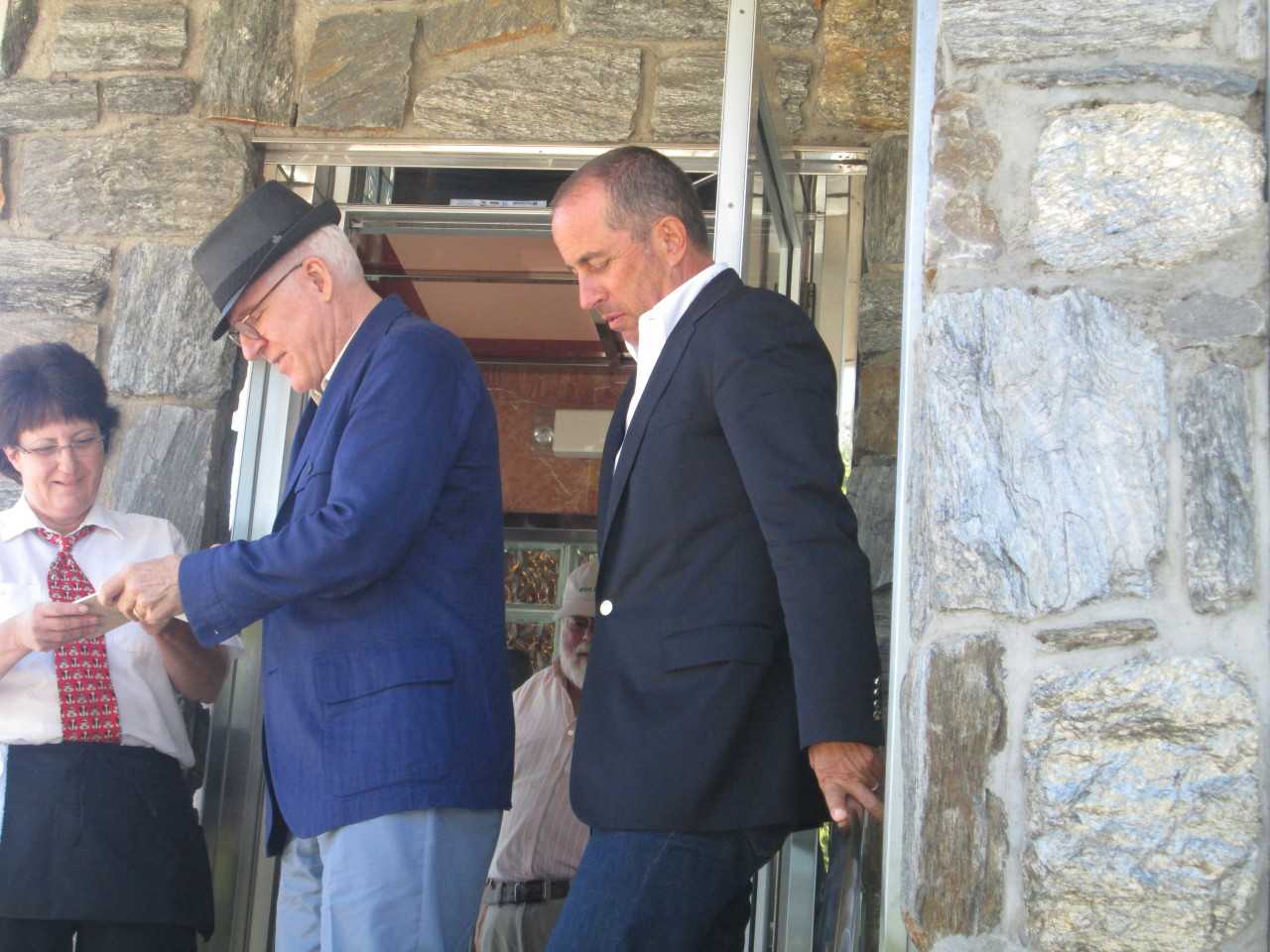 Steve Martin signs an autograph after filming "Comedians In Cars Getting Coffee" with Jerry Seinfeld. 