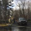 Firefighters tackle a blaze at a property at 610 Cheese Spring Road in New Canaan on Friday.