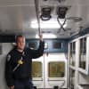 Dumont Volunteer Ambulance Corps' Captain David Oldewurtel stands in the back of one of the corps' ambulances.