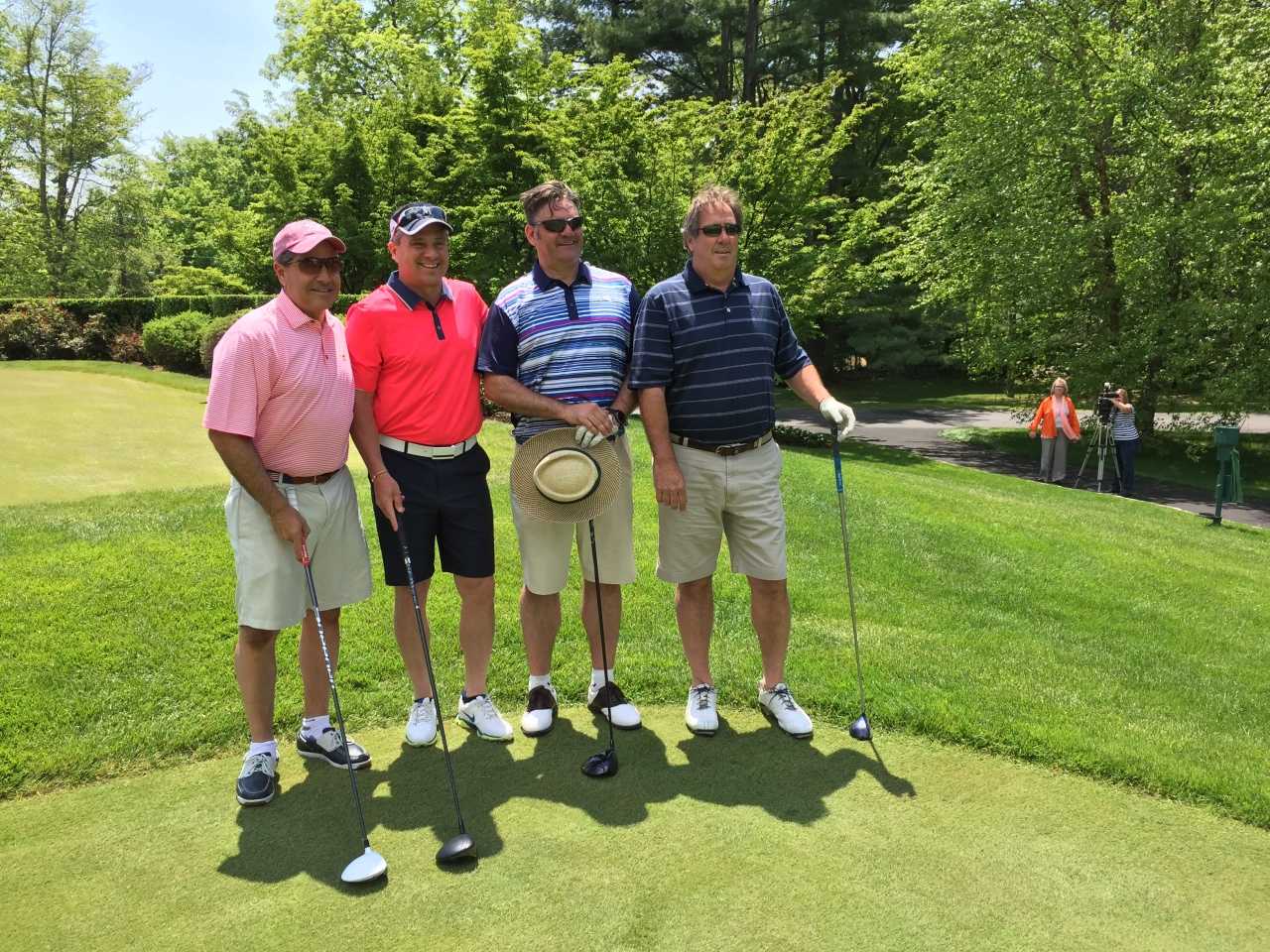 Paul Kuehner, Joe Fossi, Reed Whipple and Nick Wood prepare to tee off at the SilverSource golf outing Monday.