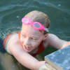 Willow Phelps of Ringwood swims in Cupsaw Lake.