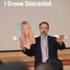 Joe Feldman, founder of End Distracted Driving, hold a picture of his daughter, Casey, who was killed by a distracted driver.
