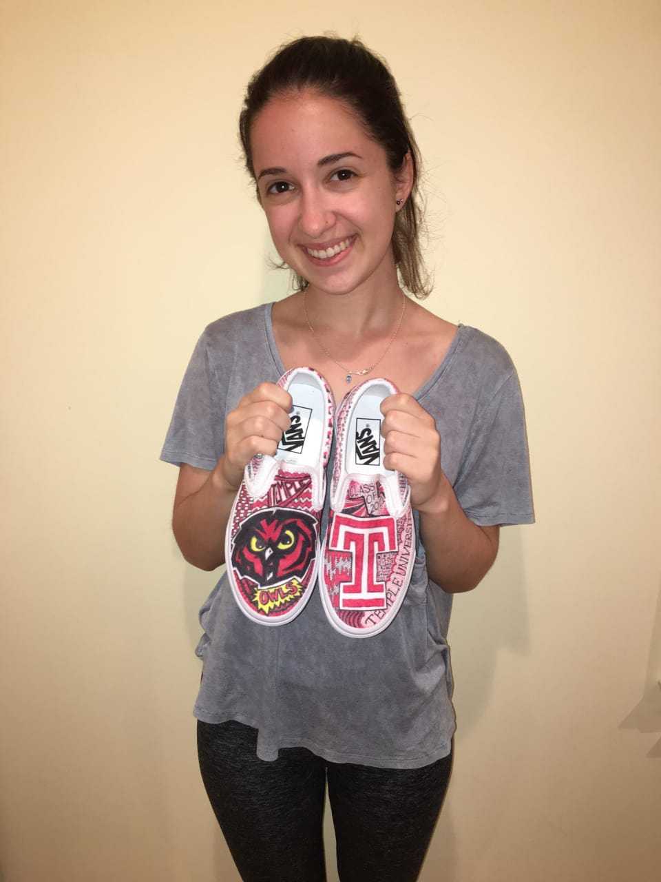New Rochelle teen Rebecca Feldman with one of her sneaker designs.