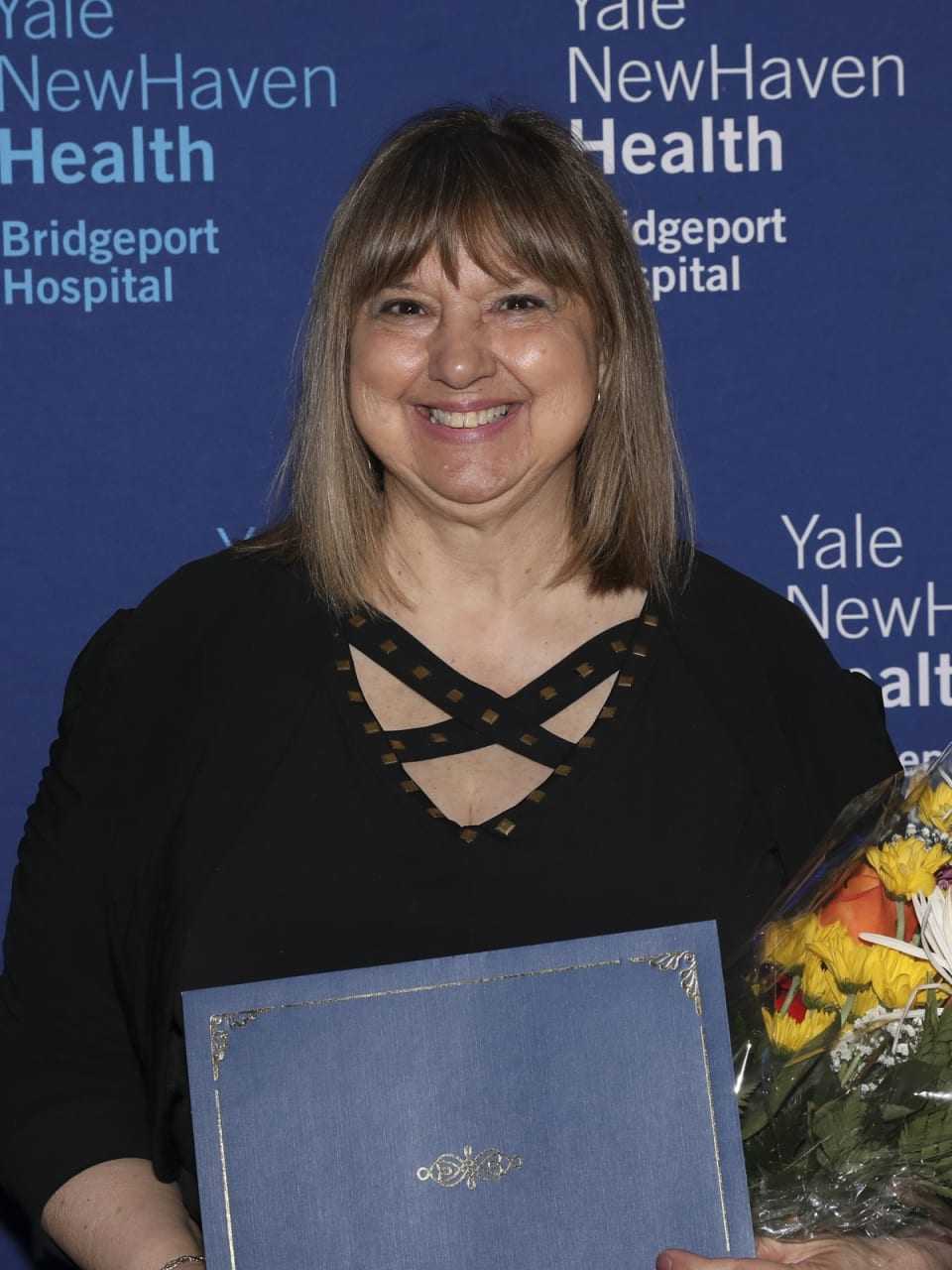 Linda Podolak, DNP, Patient Care Operations, of Trumbull, recipient of Bridgeport Hospital's award for 50 years of service