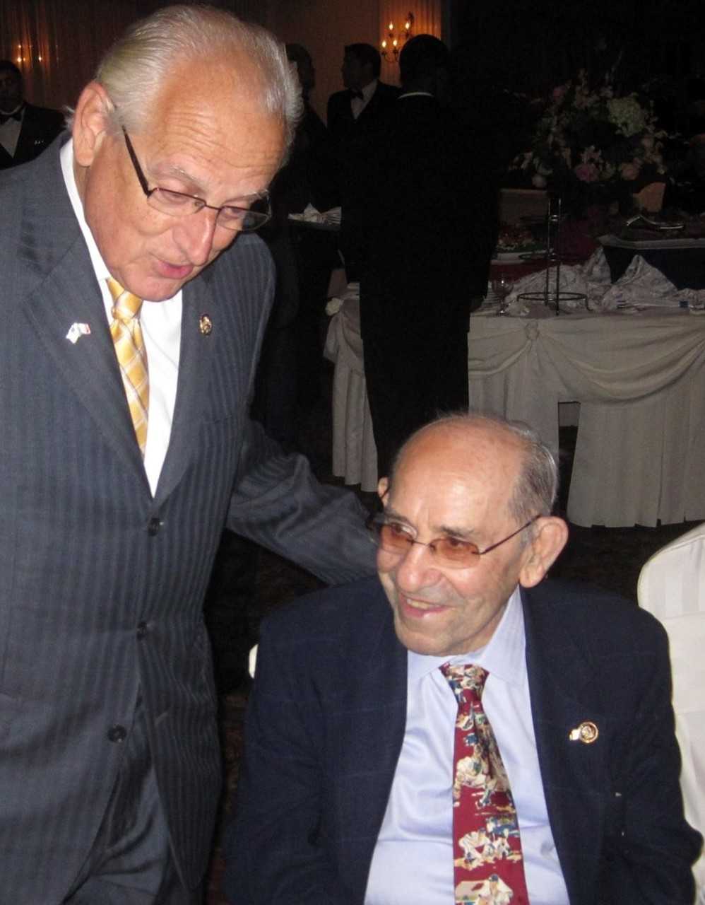 Congressman Bill Pascrell talking with Yogi Berra. 