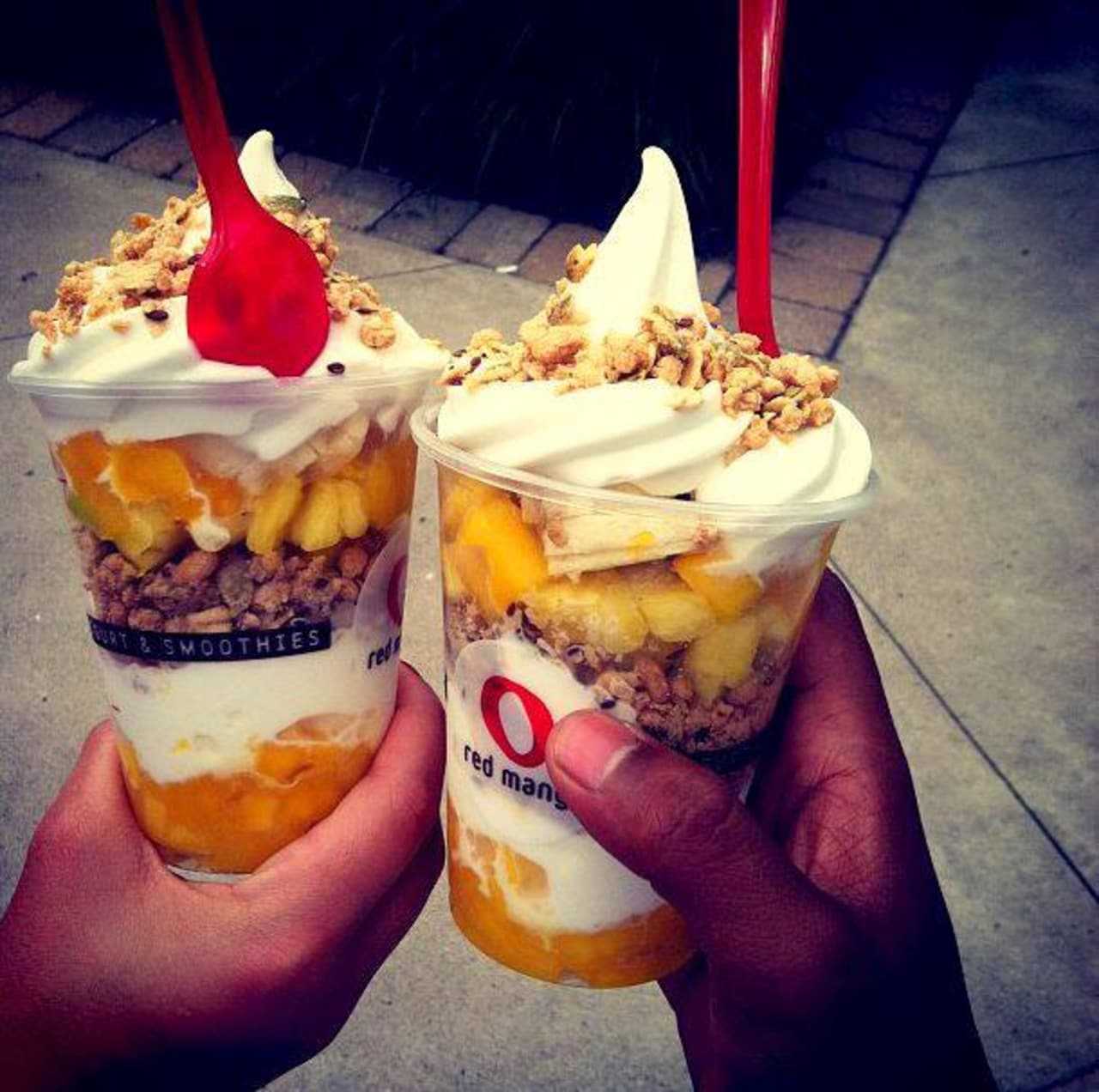 Red Mangos' parfaits are layered with frozen yogurt, fruit and other goodies.