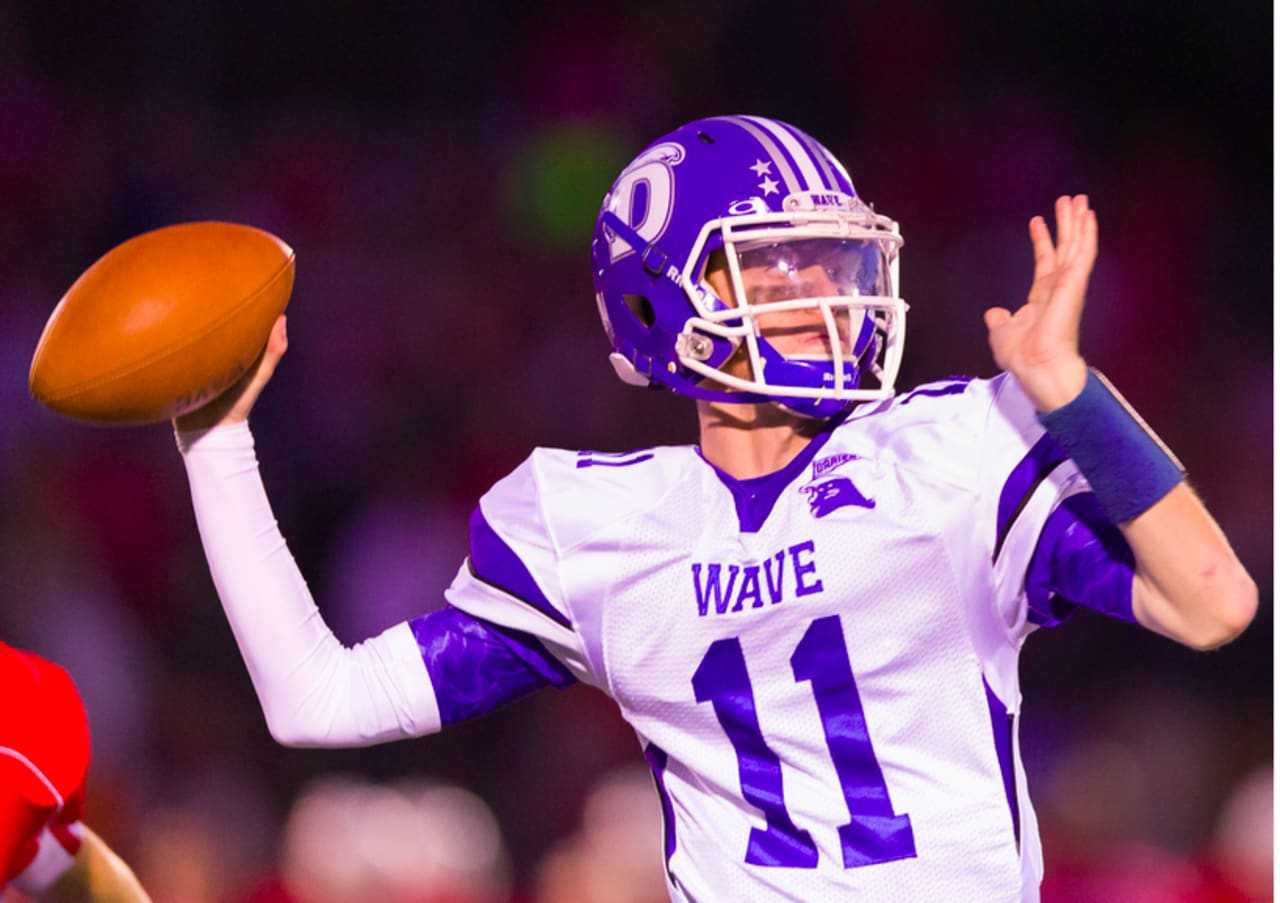 Darien High School's Tim Graham returns at quarterback for the Blue Wave, who are the defending conference champions.