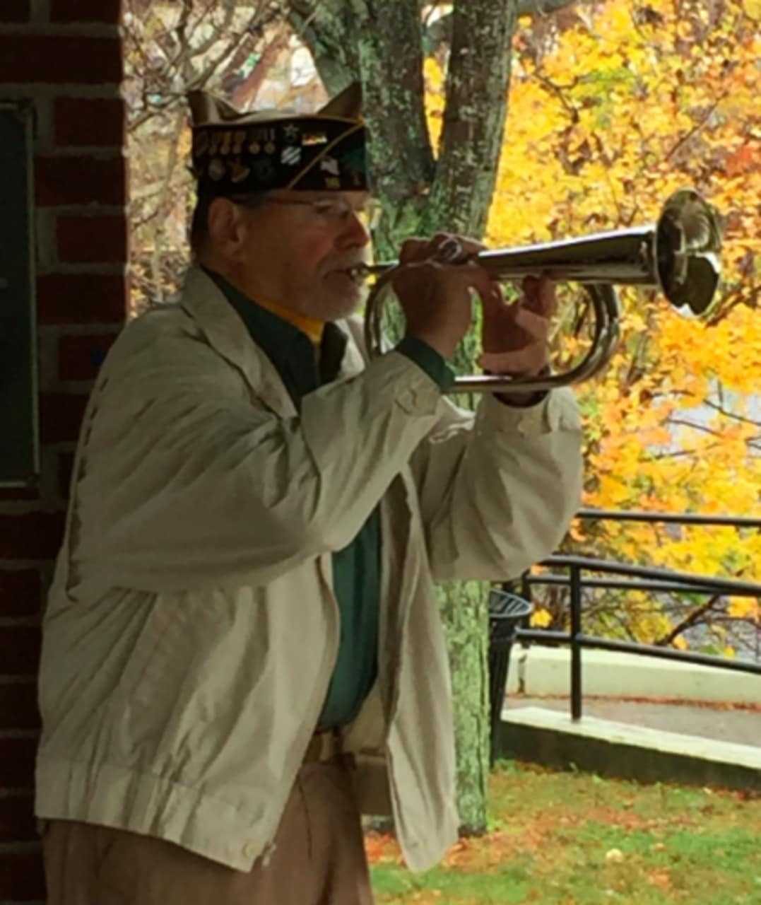 Ron Dietman plays the Last Post during the Veterans Day ceremony in Shelton on Wednesday.