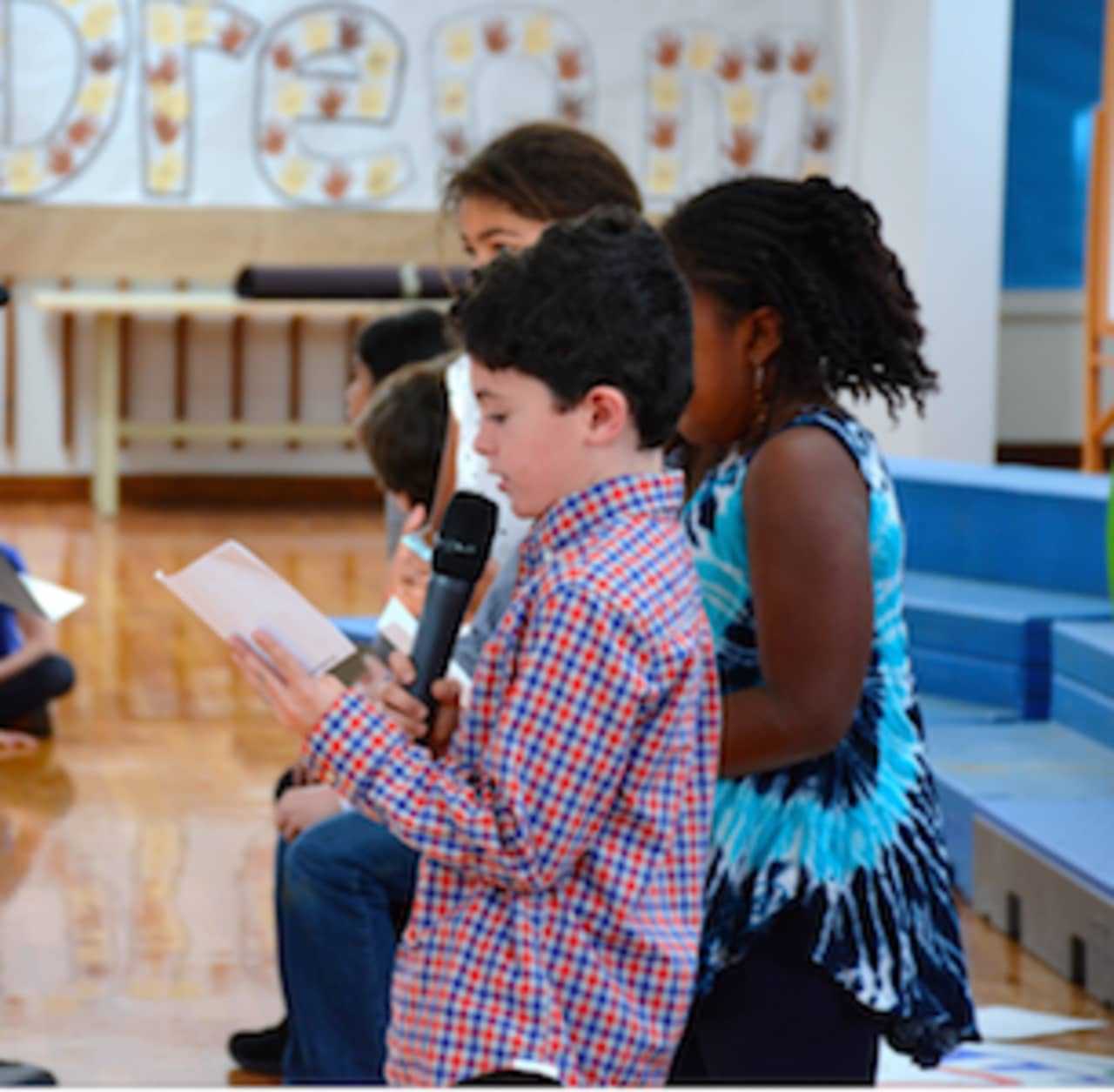 New Canaan Country School students in grades 1-4 honored Dr. King’s legacy with poems, songs and reflections on their own dreams.