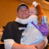 Teaneck Detective Ed Kazmierczak with his daughter at Sunday's PBA fundraiser in parts for River Edge's Baby Luke.