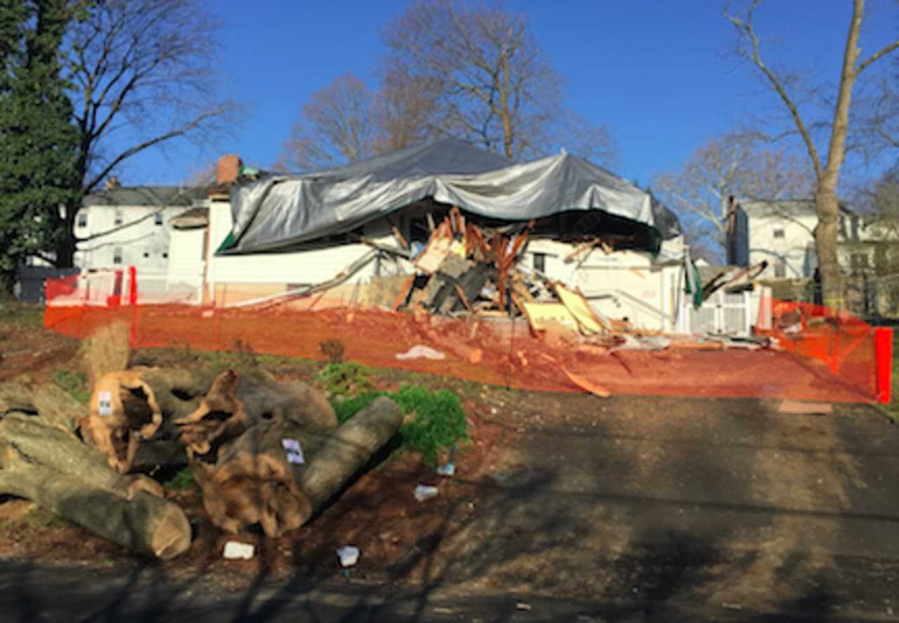 The home at 28 Elmbrook Drive that was destroyed by a tree that toppled during Sunday's high winds. No one was hurt but the family cat "Lily" is still missing.